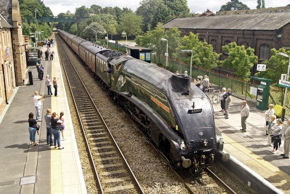A4 60009 'Union of South Africa' draws into Frodsham station for a water stop on the North Wales Coast Express.03.08.14