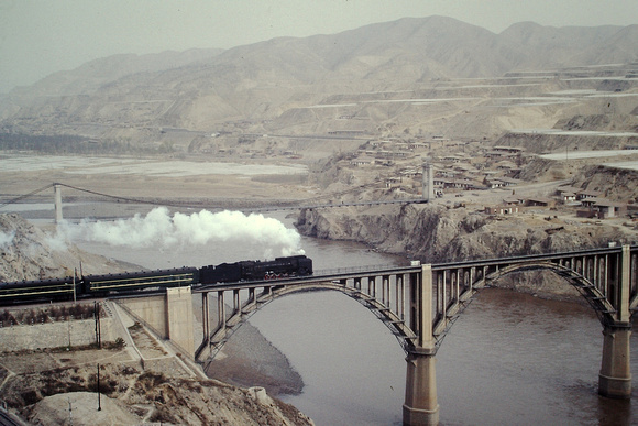 QJ on passenger train crossing the Yellow River at Lanzhou