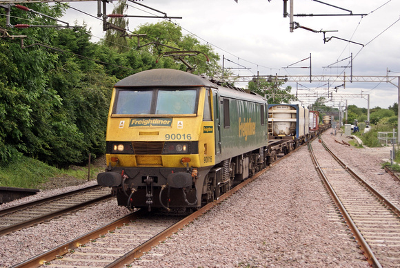 Freightliner Class 90 90016 at Acton Bridge with a light multimodal load. 17.06.14