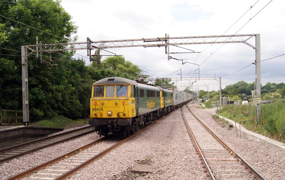 Freightliner double headed Class 86 at Acton Bridge on a container train from Liverpool.18.06.14
