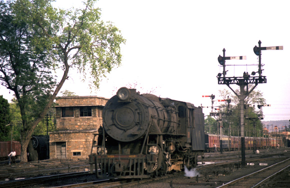 A YG 2-8-2 stands by some semaphore signals which epitomised the approach to Jaipur. 1993
