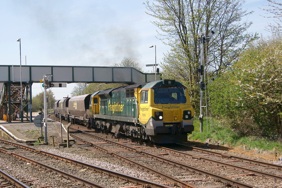 Freightliner Class 70 70002 passes through Helsby station working full coal hoppers to Fiddlers Ferry.