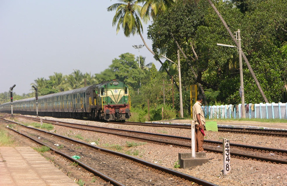 A Golden Rock liveried WDM2 passing through Majorda.