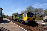 Freightliner Class 70 70002 passes through Helsby station working full coal hoppers to Fiddlers Ferry.
