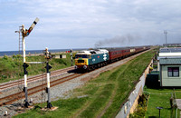 Commonwealth liveried 47580 on a Nenta railtour near Abergele, N Wales coast.05.05.12