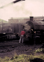 Cleaning the smokebox of 'Carr' at Ladysmith shed.