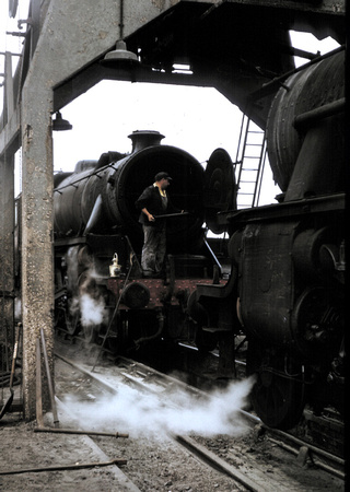 Class 5 having its smokebox cleaned at Carnforth 1968
